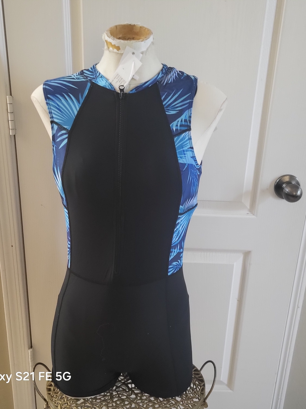 Front-Zip Black One-Piece Swimsuit with Blue Tropical Accents